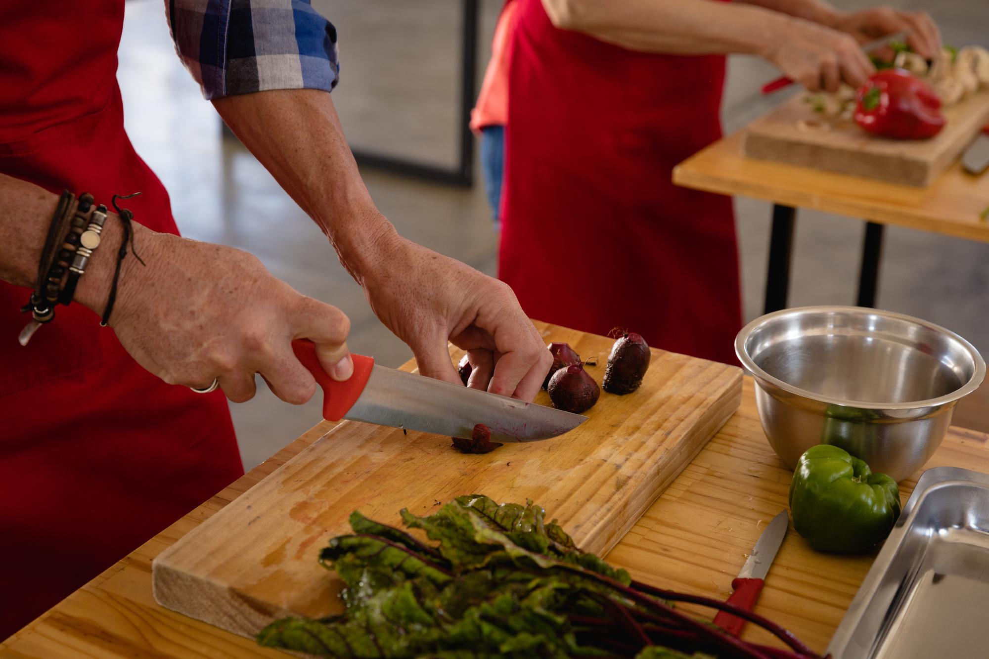 Instructor showing knife skills to group